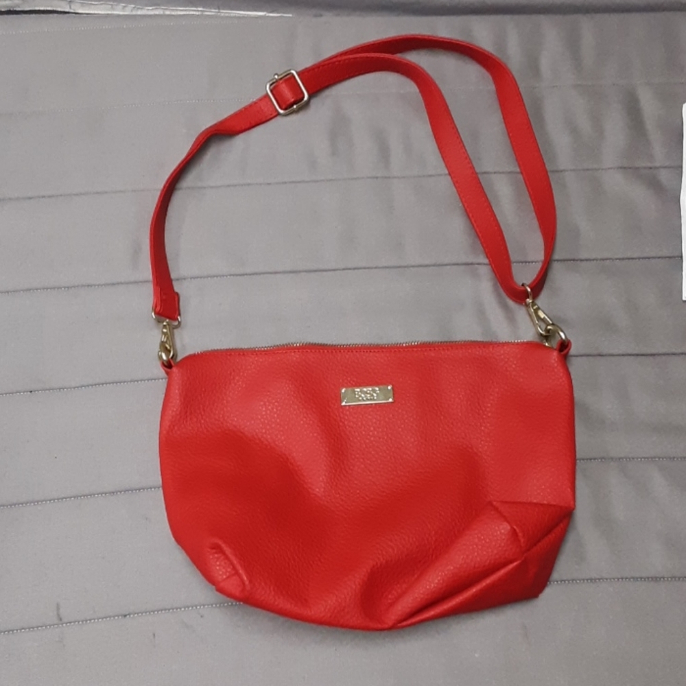 Red BCBG woman's red purse never worn without tags
